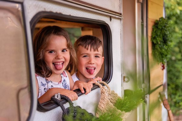 How can you ensure a pet-friendly camping environment in the busy sites of Southern England?