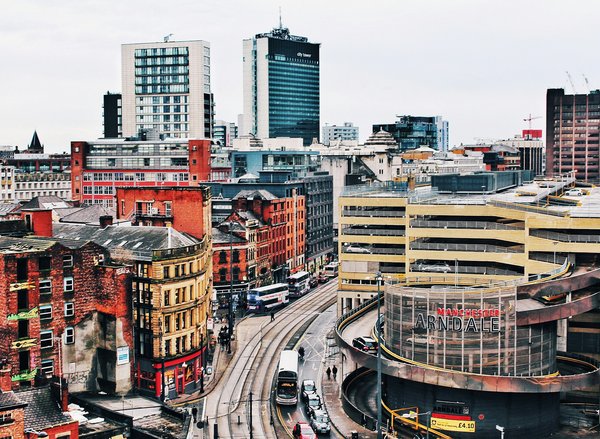 How to schedule a guided tour focusing on the industrial revolution in Manchester?